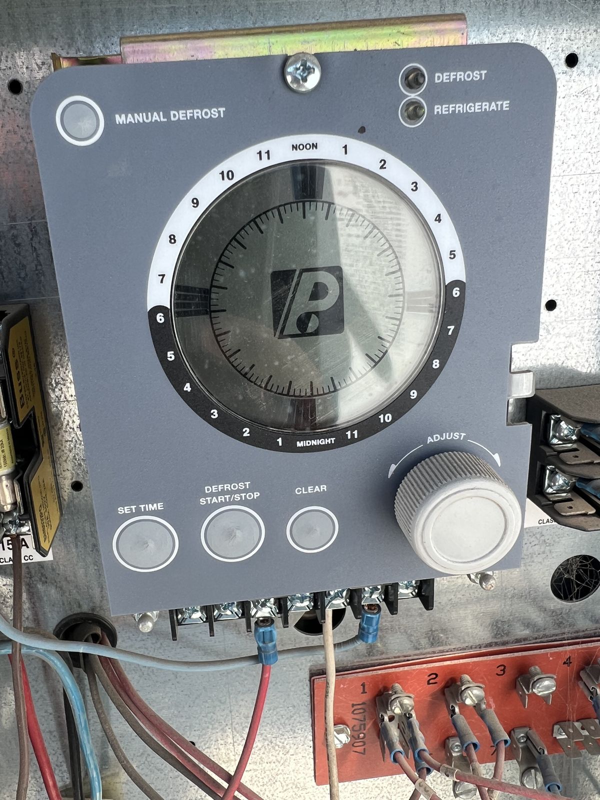 Refrigeration defrost control panel serviced by Guardian Air