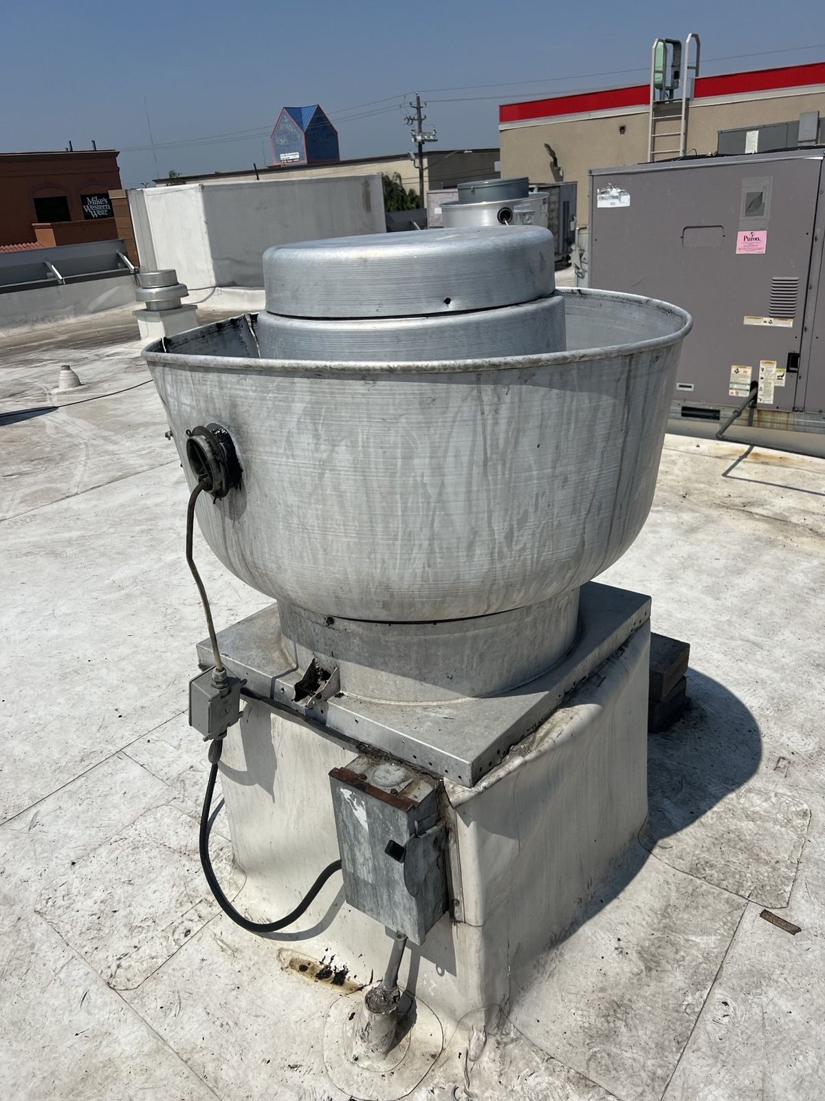 Rooftop exhaust fan assembly serviced by Guardian Air